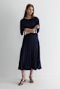Andrea Pleat Midi Skirt