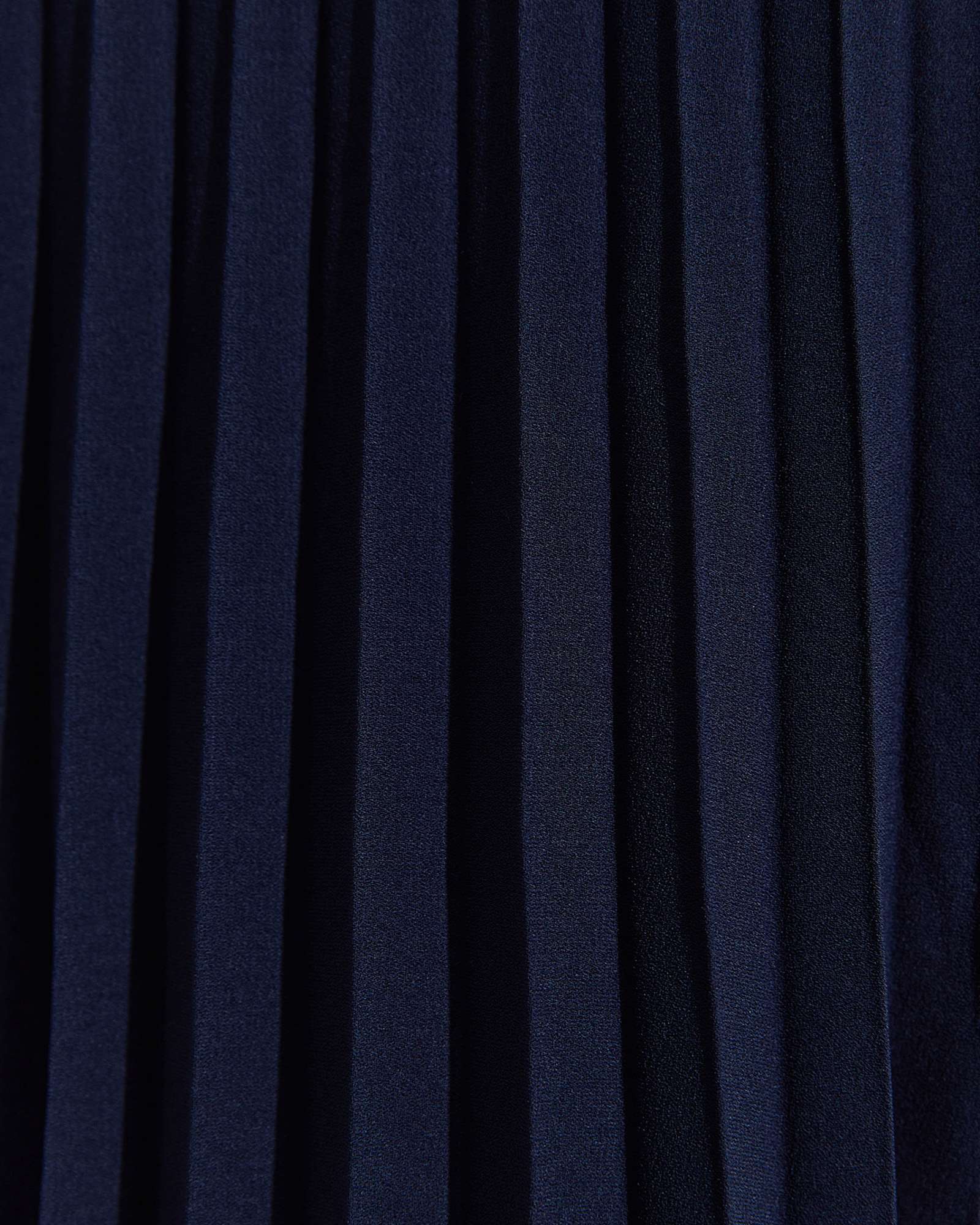 Andrea Pleat Midi Skirt in NAVY
