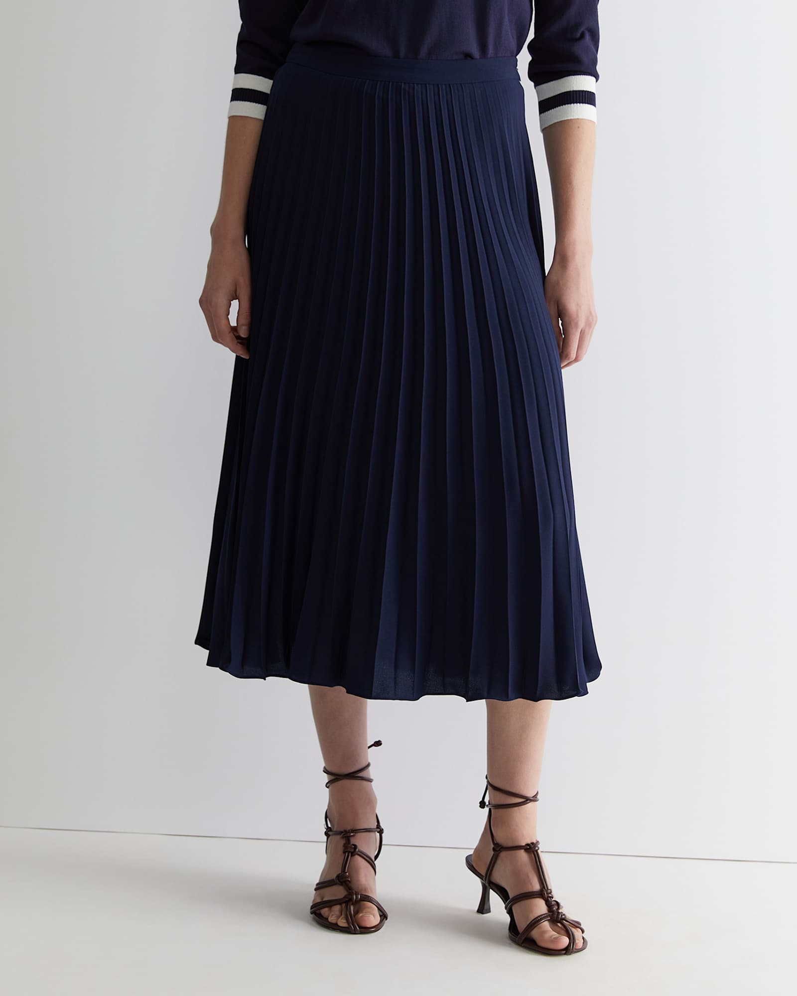 Andrea Pleat Midi Skirt in NAVY