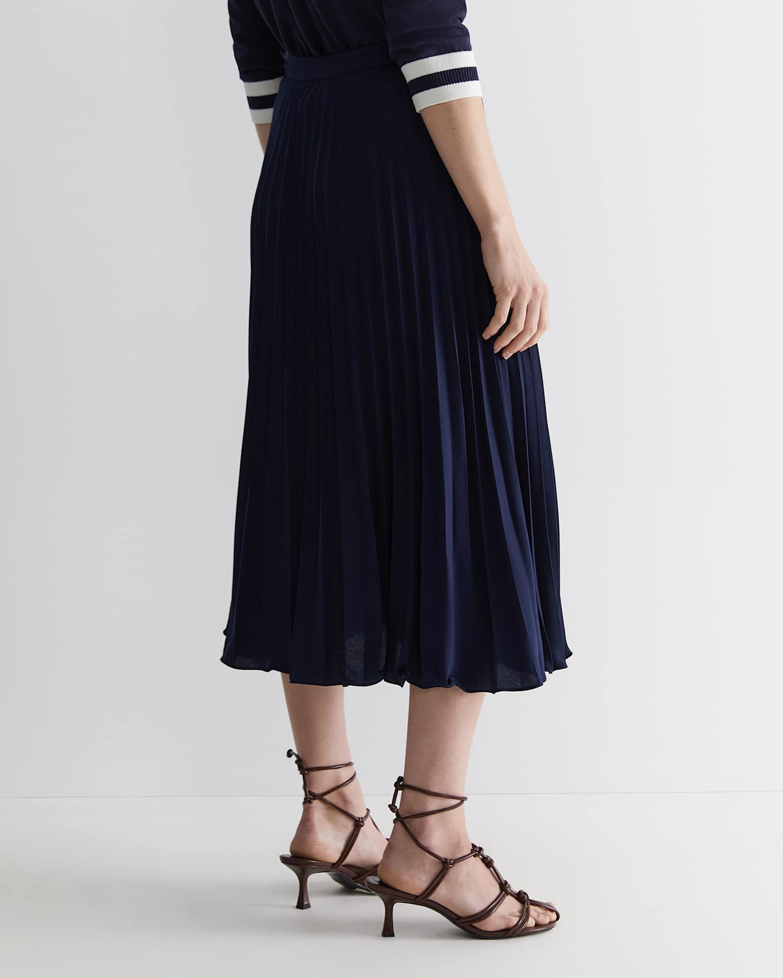 Andrea Pleat Midi Skirt in NAVY