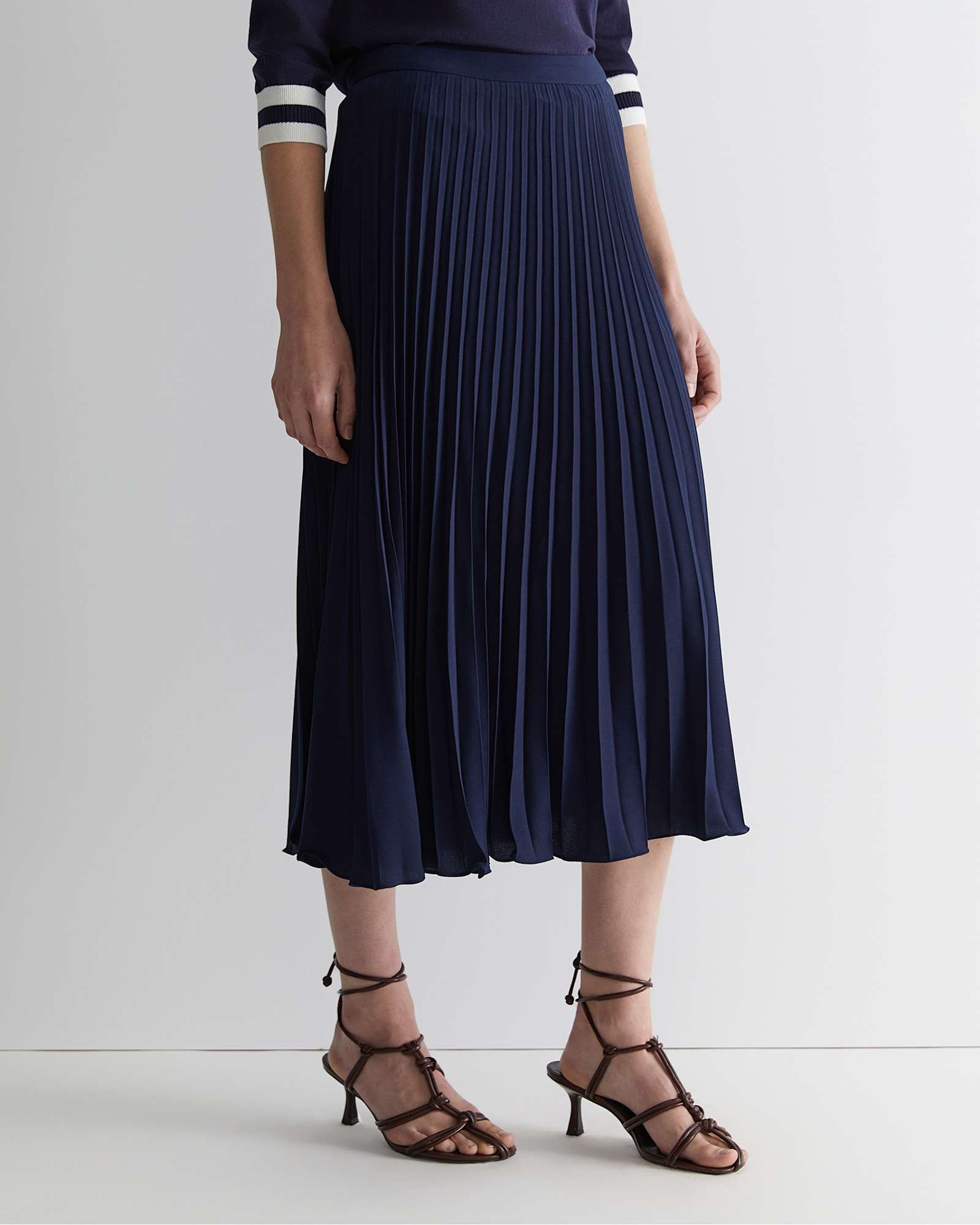 Andrea Pleat Midi Skirt in NAVY